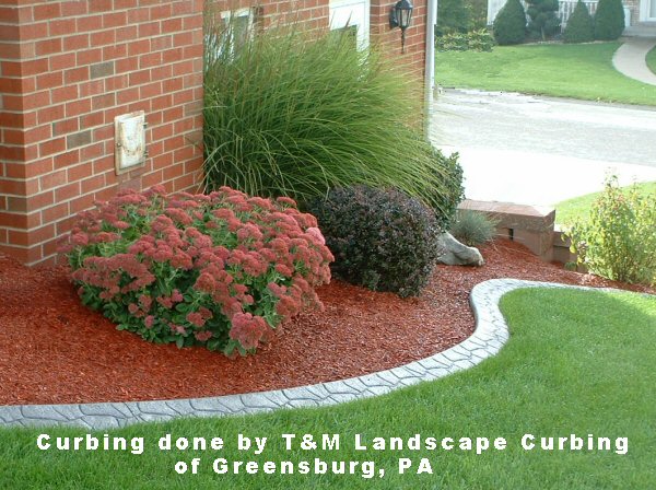 Curbing done by T&M Landscape Curbing of Greensburg, PA
