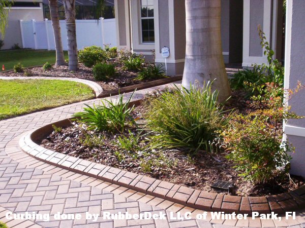 Curbing done by RubberDek LLC of Winter Park, Fl